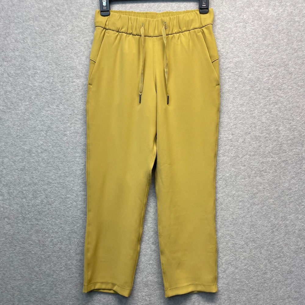 Lululemon On the Fly Crop Pants Womens‎ 2 *Woven 23 Vintage Gold Pull On